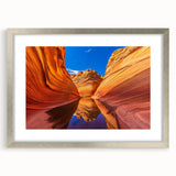 Textured art of Arizona's Coyote Buttes in muted earth tones on a silver-framed mat, ideal for bedroom art decor.