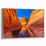Framed canvas featuring a landscape art painting of Arizona's Coyote Buttes in vibrant earth tones.