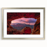 Textured art print of Sedona's landscape in abstract style, with earthy red and brown tones on a silver-framed matte canvas.