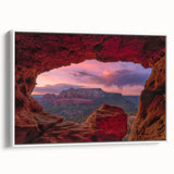 Vintage poster art of Sedona, Arizona landscape on a framed canvas, featuring vibrant red and orange tones.