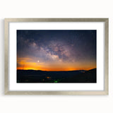 Textured art depicting an abstract Arkansas landscape in earthy tones on a silver-framed mat, suitable for bedroom decor.