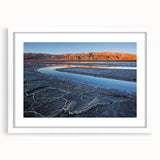 Abstract art print depicting Death Valley in muted earth tones on a framed white matte canvas.