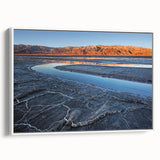Vintage poster art of Death Valley in a white framed canvas, featuring muted earth tones, ideal for living room decor.