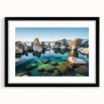 Extra large textured abstract art print of Lake Tahoe in colorful hues, framed in black, ideal for living room decor.
