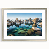 Textured art print of Lake Tahoe with abstract design in cool blue tones, framed in silver, suitable for bedroom decor.
