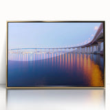 Acrylic print of San Diego skyline in gold and blue tones, framed, mid-century modernist style.