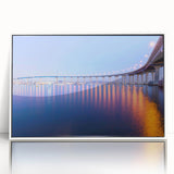 Art deco poster of San Diego skyline in muted blue tones, framed in white acrylic, suitable for modern nursery decor.