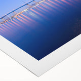 Art deco poster of San Diego skyline in muted blue tones on rolled canvas, suitable for dining room decor.