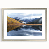 Textured abstract art print of Vail, Colorado in muted earth tones on a framed silver mat, ideal for bedroom art.