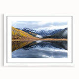 Abstract art print of Vail, Colorado scenery in muted earth tones on a white-framed mat.
