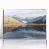 Acrylic print of Vail, Colorado scenery in soft, natural hues, framed in white, suitable for modern nursery decor.