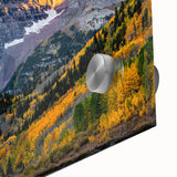 Large abstract depiction of the Rocky Mountains in muted earth tones on acrylic glass, suitable for dining room art.