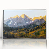 Acrylic print of the Rocky Mountains in muted earth tones, framed in white, ideal for modern art wall decor.