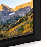 Extra large framed canvas of the Rocky Mountains in black with colorful, textured art accents, ideal for living room decor.