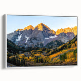 Vintage poster art of the Rocky Mountains on a framed canvas, with earthy tones, ideal for living room decor.
