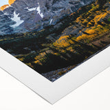 Art deco poster of the Rocky Mountains in muted earth tones on rolled canvas, suitable for dining room decor.