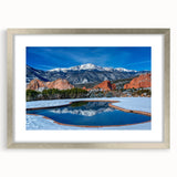Textured abstract art print of Colorado Springs in muted earth tones on a framed canvas, ideal for bedroom art.