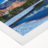 Art deco poster of Colorado Springs scenery on rolled canvas, featuring muted earth tones, ideal for dining room wall art.