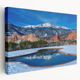 Scenic view of Colorado Springs on a large stretched canvas, featuring earthy green and blue tones.