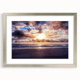 Textured art depicting abstract Daytona scenery in muted earth tones on a framed silver mat, suitable for bedroom decor.