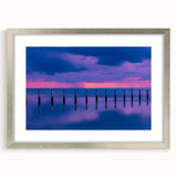 Textured art print of the Florida Keys in abstract style, featuring muted blue and green shades on a framed silver mat.