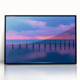 Large abstract wall art depicting the Florida Keys in muted oceanic blues and greens, framed in black acrylic.