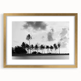 Abstract art print of Miami skyline in textured gold frame, featuring muted blue and orange tones.
