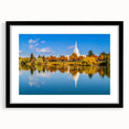 Abstract art print of vibrant Idaho scenery on textured canvas, framed in black, suitable for large living room walls.
