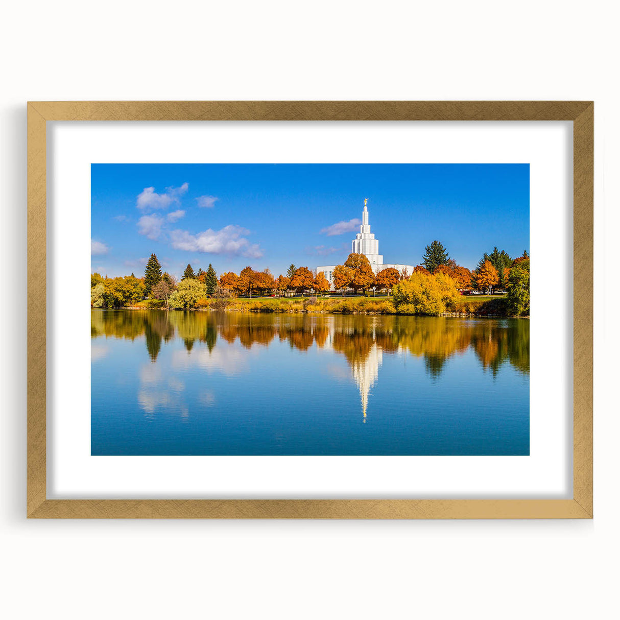 Extra large abstract art print of Idaho scenery in muted earth tones on a gold-framed canvas, ideal for living room decor.