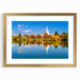 Extra large abstract art print of Idaho scenery in muted earth tones on a gold-framed canvas, ideal for living room decor.