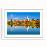 Abstract art print of Idaho scenery in muted earth tones, framed with a white mat, suitable for dining room decor.