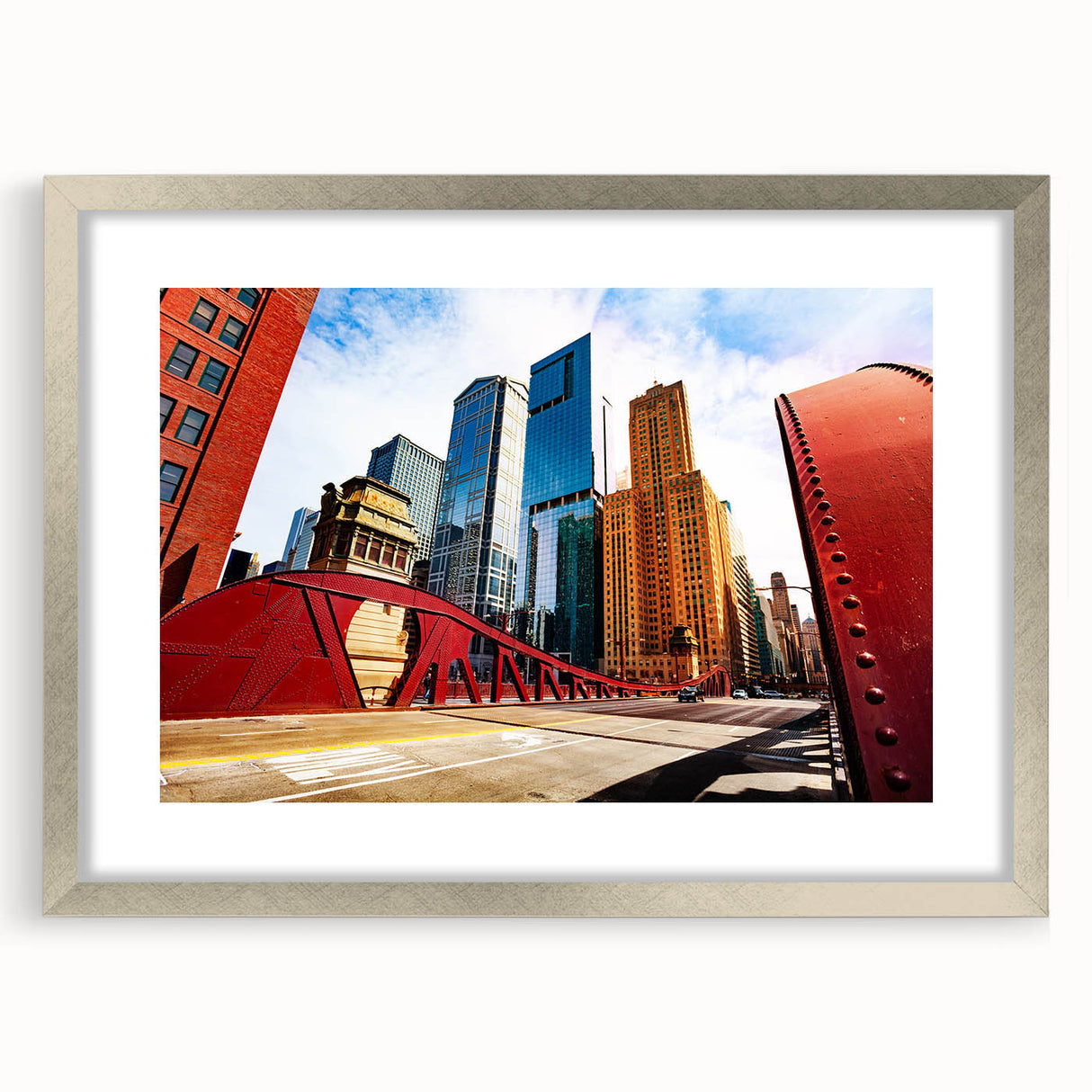 Textured art print of Chicago skyline in abstract style with muted gray and blue tones, framed in silver.