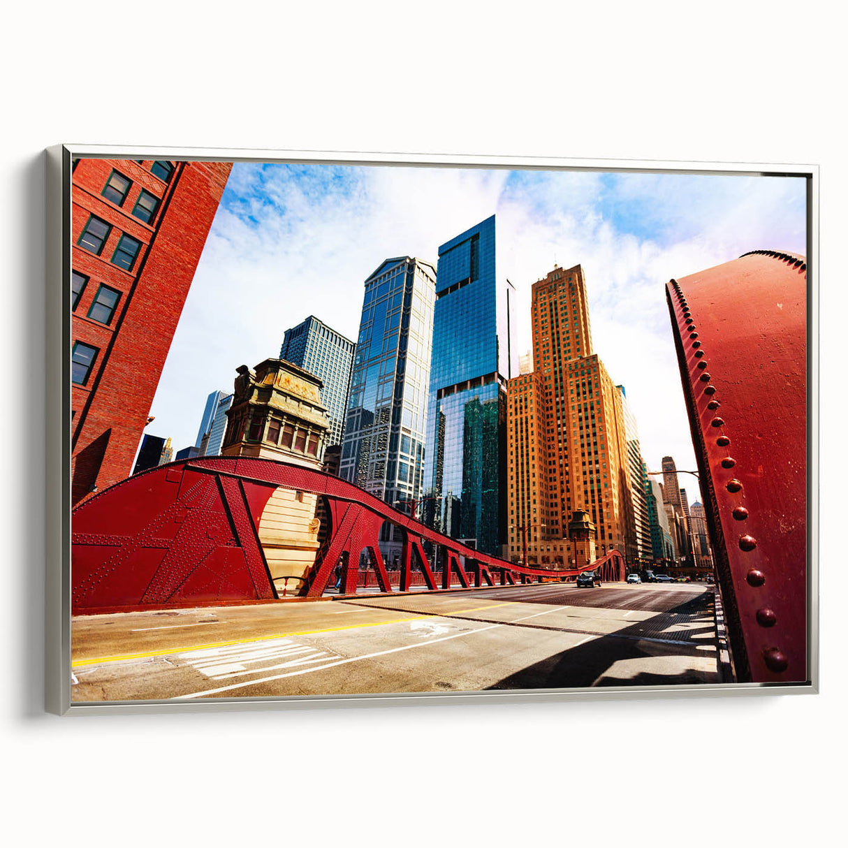 Framed canvas featuring a vintage poster-style landscape painting of the Chicago skyline in colorful and black tones.