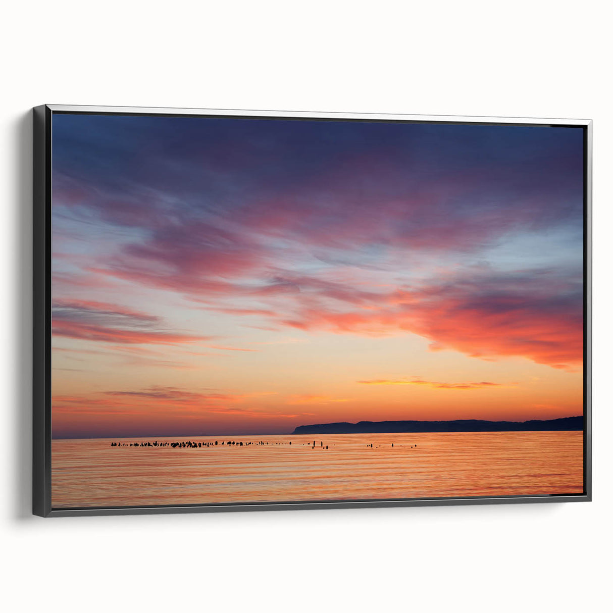 Black and white framed canvas of Lake Michigan landscape, ideal for bedroom wall art.