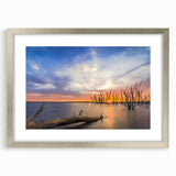 Textured abstract art print of a Kansas landscape in muted earth tones, framed in silver, ideal for bedroom wall decor.