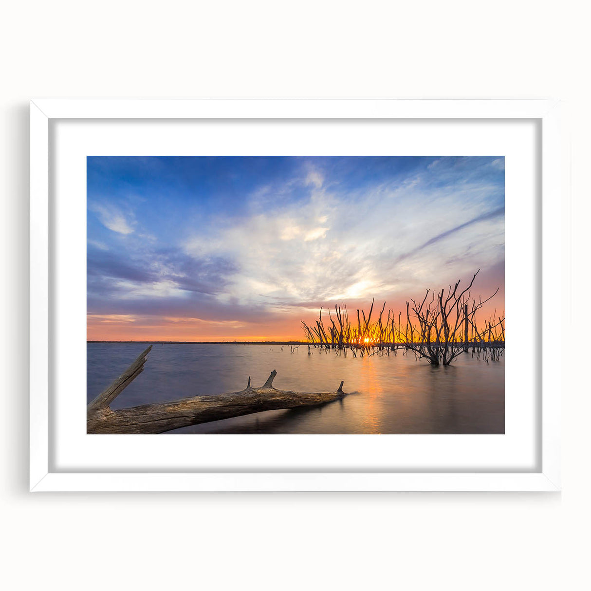Abstract art print of Kansas scenery in muted earth tones on a white-framed canvas.