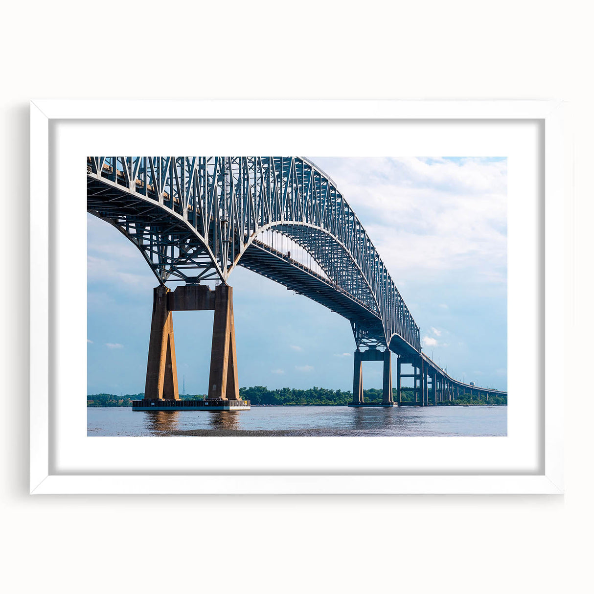 Abstract art print of Baltimore skyline in muted gray and blue tones, framed with a white mat.