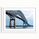 Abstract art print of Baltimore skyline in muted gray and blue tones, framed with a white mat.