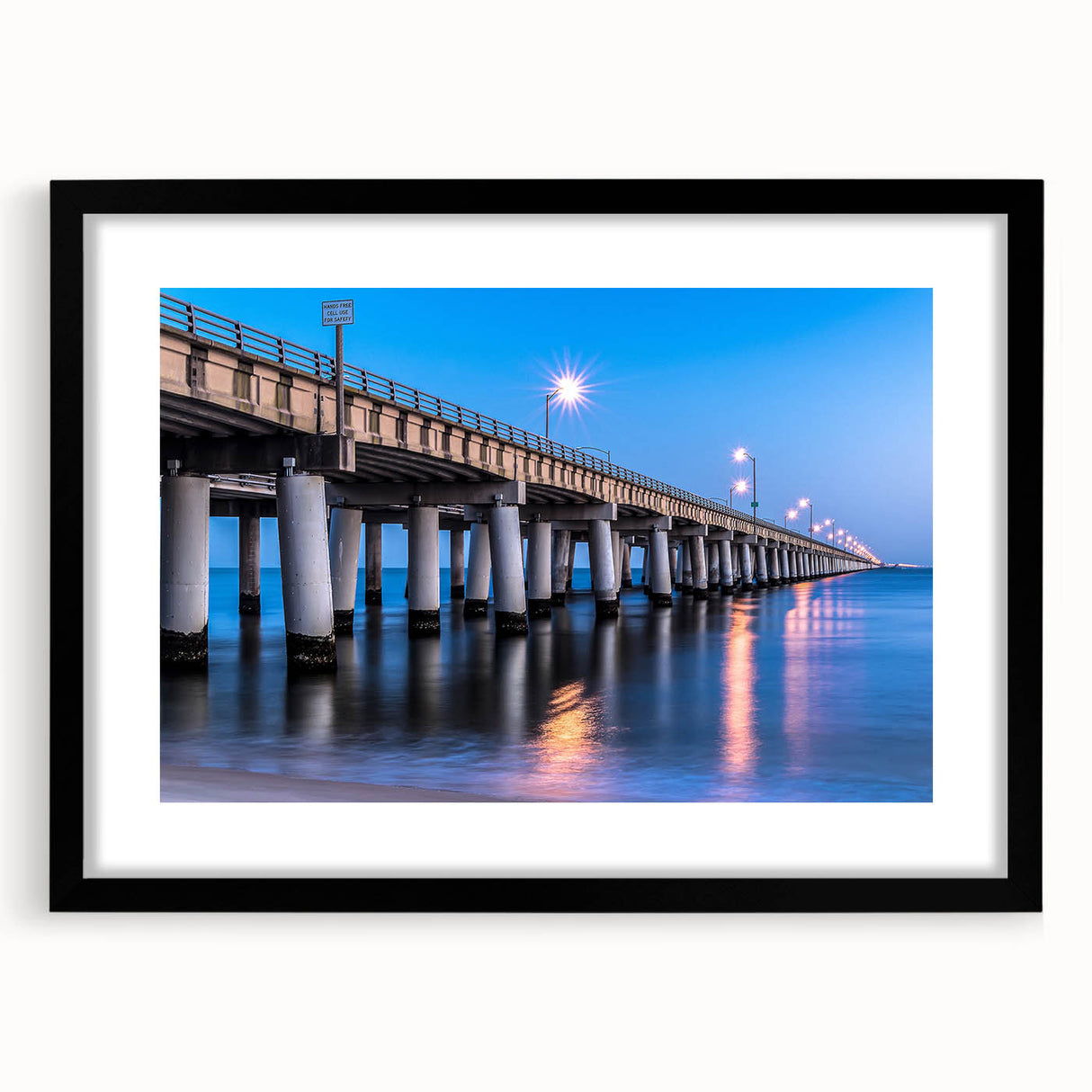 Extra large abstract art print of Chesapeake Bay with vibrant, textured colors on a framed black mat.