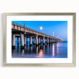 Textured art depicting abstract Chesapeake Bay in muted blue and green tones, framed with a silver mat.