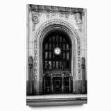 Large abstract depiction of Detroit skyline in muted gray and blue on acrylic glass.