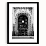 Extra large abstract art print of Detroit skyline with vibrant, textured colors on a framed black mat.