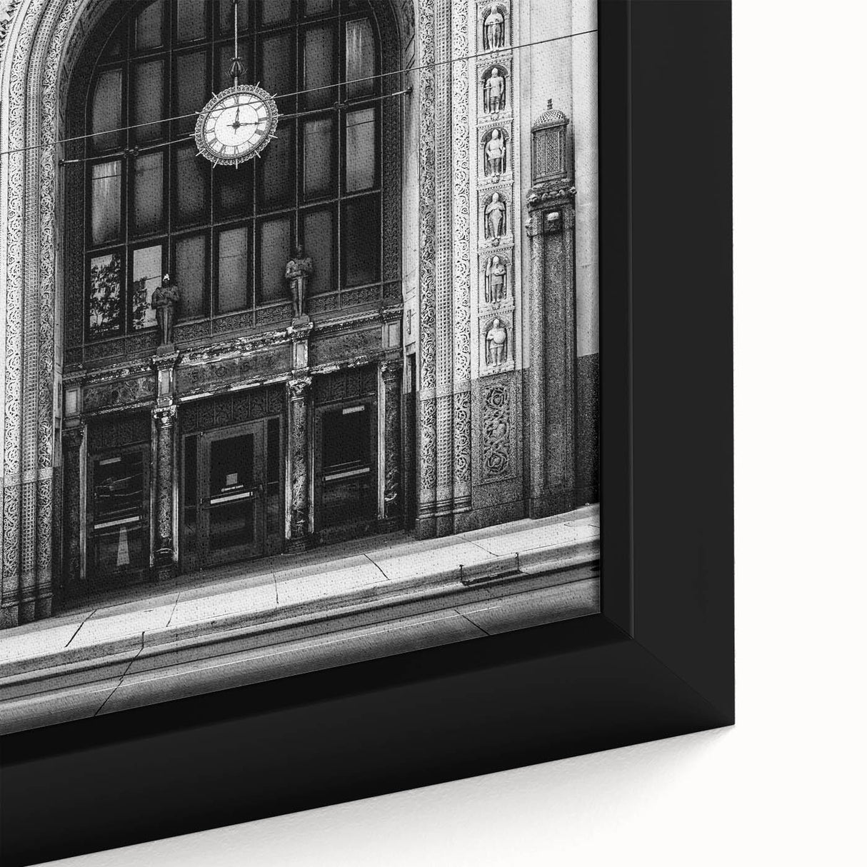 Close-up of extra large framed canvas featuring a textured depiction of Detroit skyline in black with colorful accents.