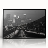 Large abstract wall art depicting the Minneapolis skyline in muted gray and blue tones on a framed acrylic.