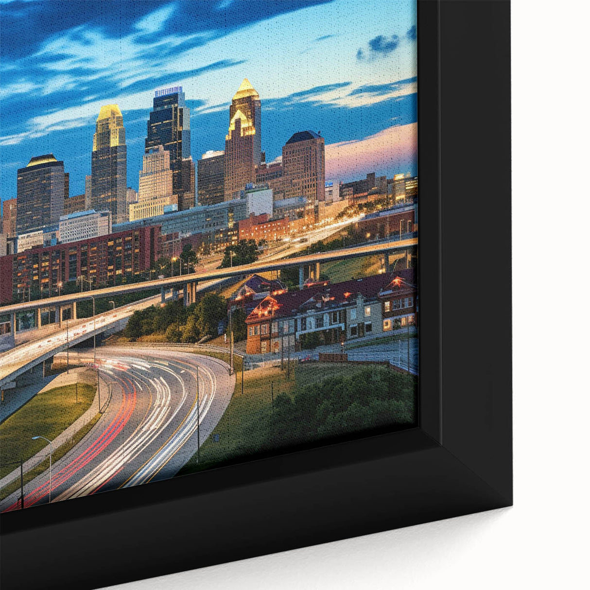 Extra large framed canvas of Kansas City skyline in black with colorful, textured highlights, ideal for living room decor.