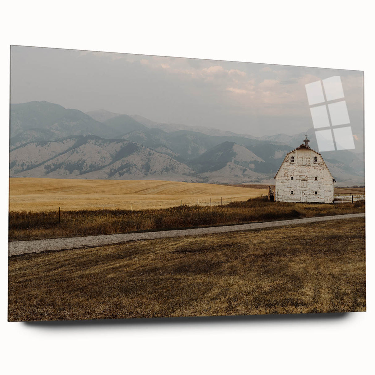 Large abstract wall art depicting a serene Montana landscape in muted earth tones on acrylic glass.