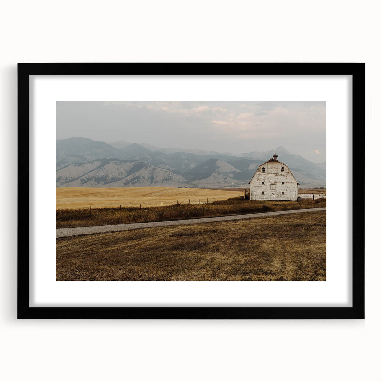 Abstract art print of a colorful Montana landscape in textured tones on a large framed canvas, ideal for living room decor.