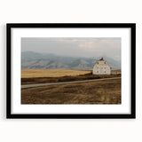Abstract art print of a colorful Montana landscape in textured tones on a large framed canvas, ideal for living room decor.