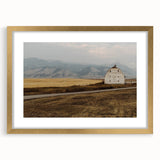 Extra large abstract art print depicting a textured Montana landscape in muted earth tones, framed in gold.