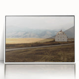 Acrylic print of a serene Montana landscape in muted earth tones, framed in white, suitable for modern art wall decor.